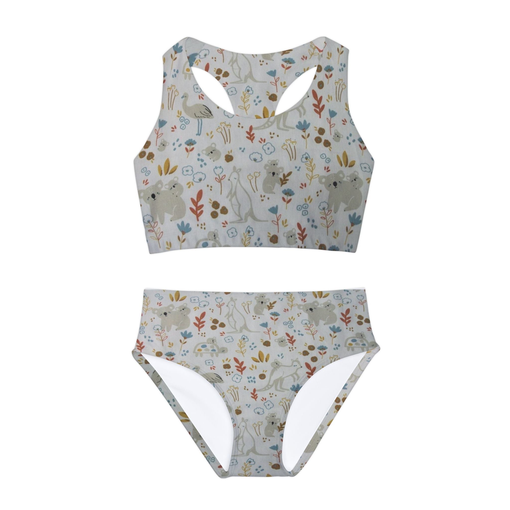 Introducing our vibrant Animals Swimsuit, a perfect blend of playful design and comfort, ideal for beach outings, pool parties, or sunny adventures. This charming swimsuit features an eye-catching print that showcases Australia’s most beloved wildlife – kangaroos, koalas, and turtles – bringing a splash of whimsy and a touch of nature to swimwear.
