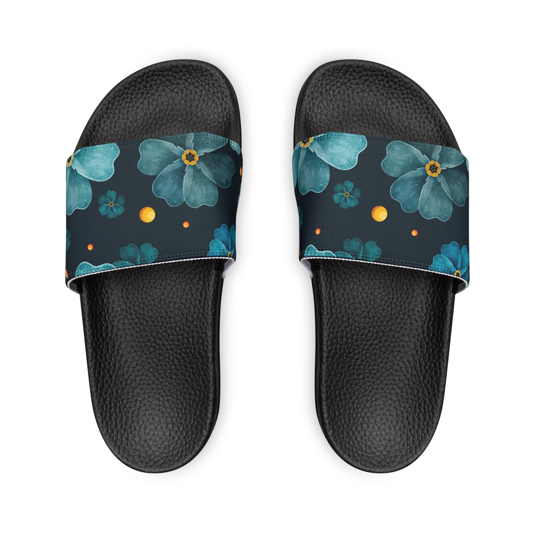 Blue Night Flowers Slides are a captivating footwear option that seamlessly combines comfort and style, making them the perfect accessory for any girl who wants to express her aesthetic flair. Designed with the modern young woman in mind, these slides are not just a pair of shoes; they are a statement piece that elevates any outfit from casual to chic.