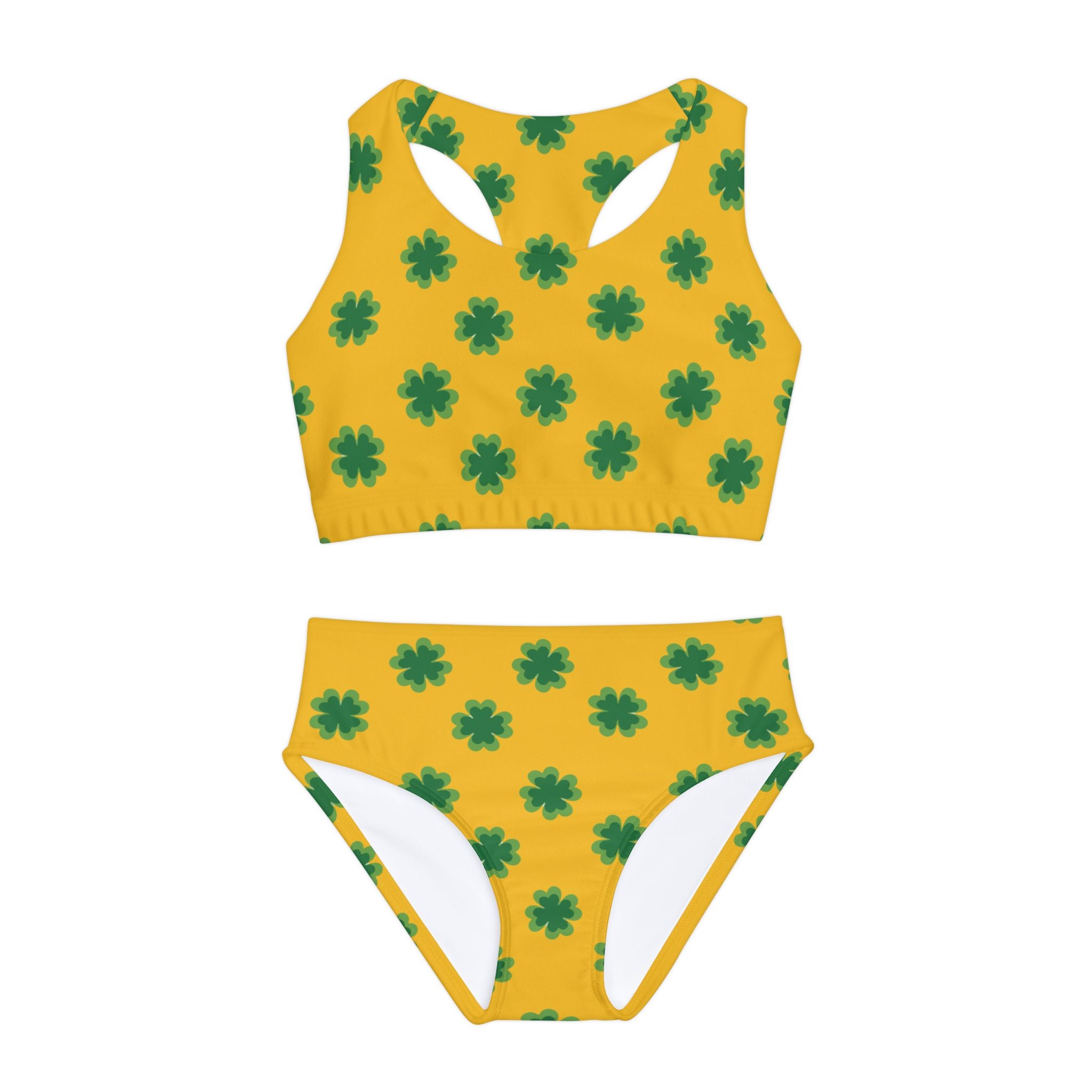 The yellow clover swimsuit for girls is a bright, cheerful option perfect for summer fun at the pool or beach. Crafted with care, this vibrant yellow one-piece swimsuit is designed with both style and comfort in mind, ensuring your little girl enjoys her swim time with ease and confidence.